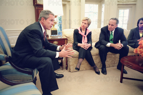 U.S. President George W. Bush meeting with and members of congress from states impacted by