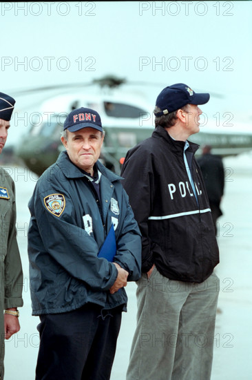 New York City Mayor Rudolph Giuliani and New York Governor George Pataki awaiting the arrival of U