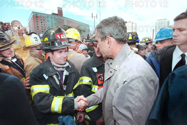 U.S. President George W. Bush greeting firefighters, police and rescue personnel at World Trade