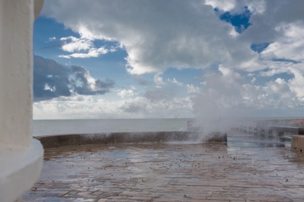 Wave flooding the dyke