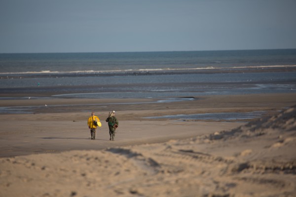 Le Touquet Paris Plage, fishermen in yellow oilskins