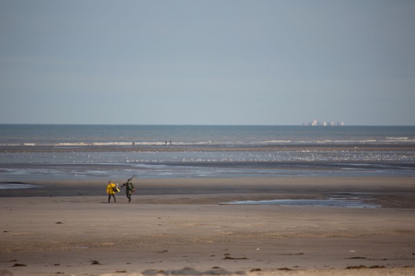 Le Touquet Paris Plage, fishermen in yellow oilskins