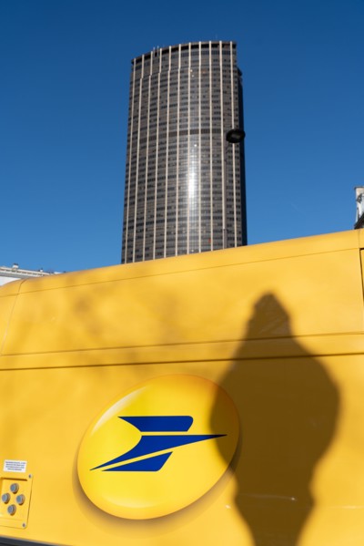Paris, logo of the French post and Tour Montparnasse in the distance
