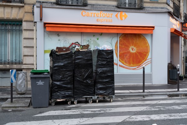Paris, food stores, garbage on the street