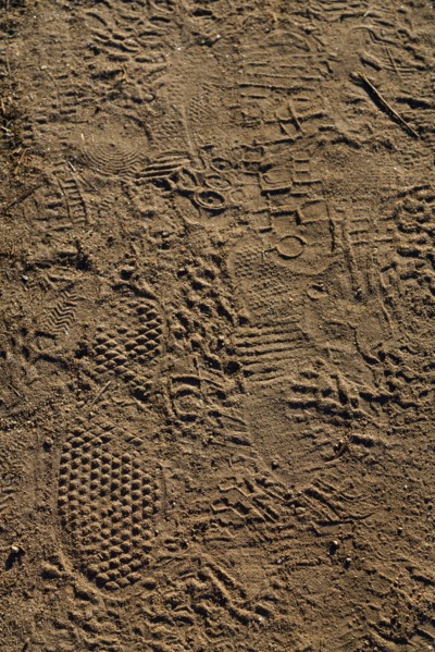 Hikers' footprints on the coastal path, Le Conquet, North tip of Finistère