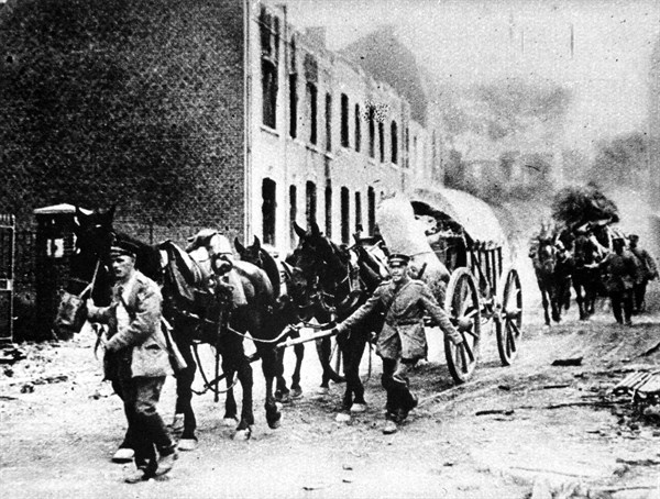 Food raid by German soldiers in an abandoned French village.