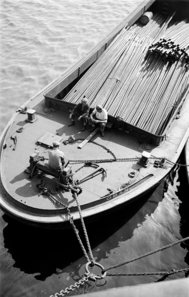 Thames bargemen on their barge, c1945-c1965