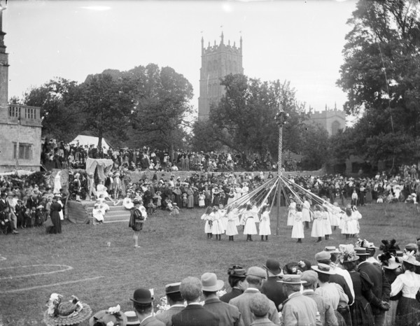Children taking part in the village maypole dance at Chipping Campden, Gloucestershire
