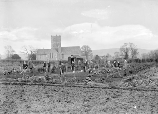 Schoolboys working in the school garden supervised by a teacher, Uffington, Oxfordshire, 1916