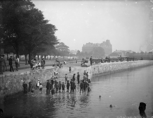Children play ducks and drakes in the River Itchen, Southampton, Hampshire, c1878