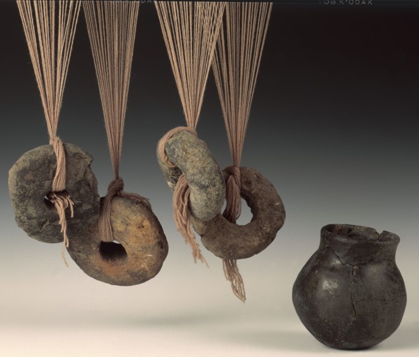 Clay loomweights and pot. Artist: Unknown