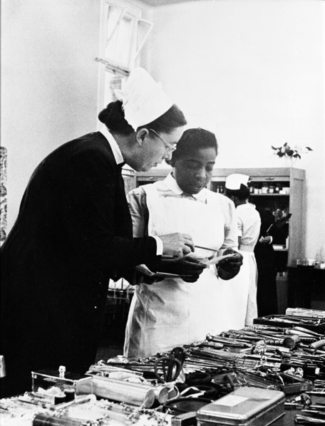 A nurse being trained, 1960. Creator: Henry Grant.