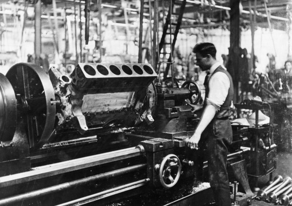 A man operating a jig at the Napier works, July 1920. Artist: Unknown