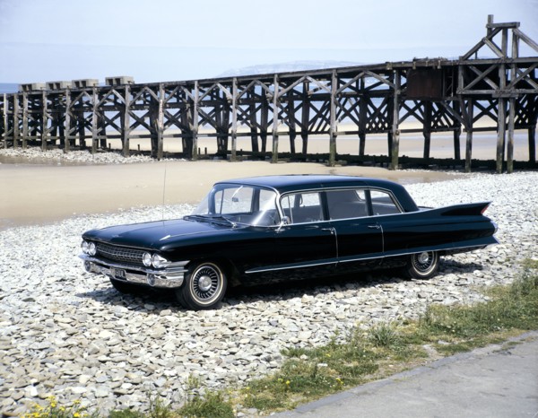 A 1961 Cadillac Presidential limousine on a beach. Artist: Unknown