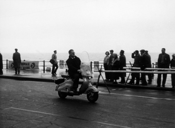 A man on a Lambretta scooter, taking part in the Daily Express rally, 1953. Artist: Unknown