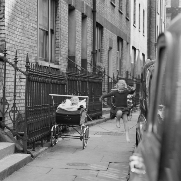 Girl skipping, London, 1960-1965