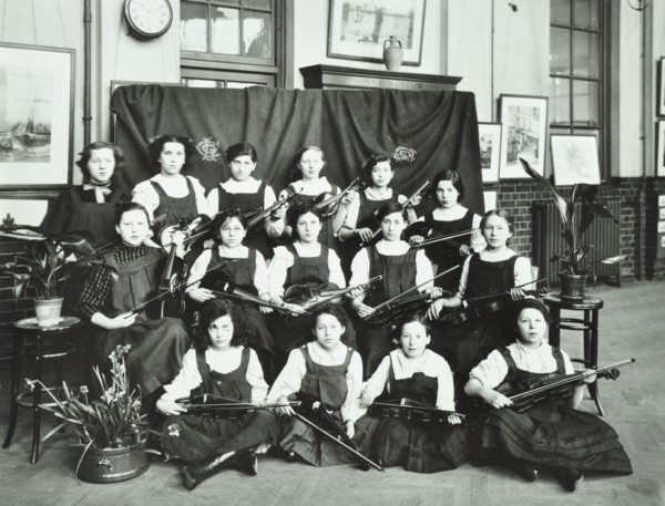 Girls swimming championship team with their shield, Tollington Park Central School, London, 1915. Artist: Unknown.