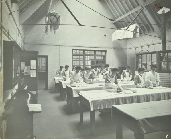 The ironing room, Battersea Polytechnic, London, 1907. Artist: Unknown.