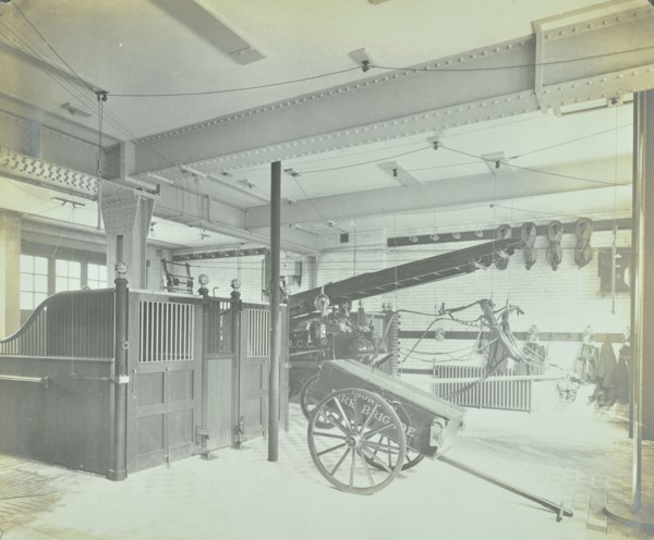 Interior of appliance room, Northcote Road Fire Station, Battersea, London, 1906. Artist: Unknown.