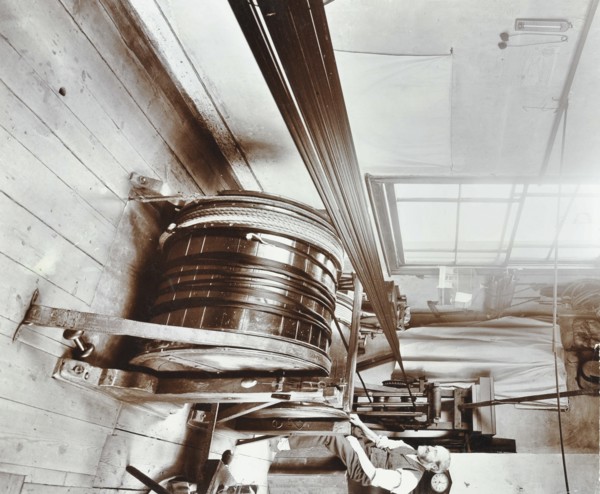 Spitalfields silk weaving industry, Alma Road, Bethnal Green, London, 1909. Artist: Unknown.