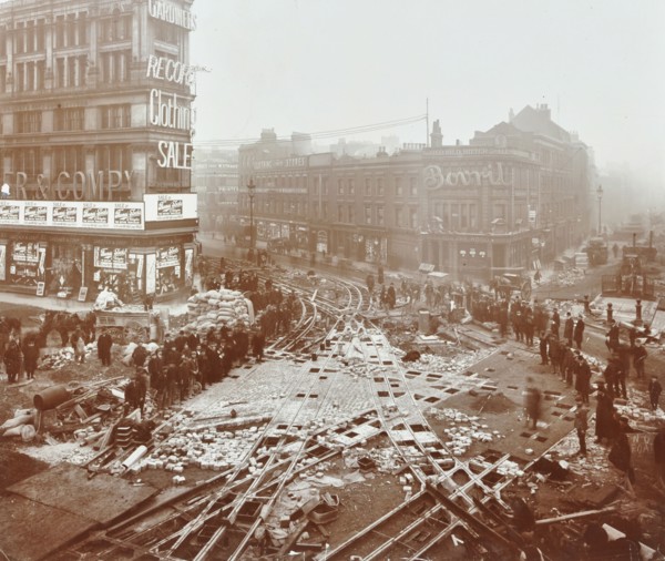 Laying tramlines at the junction of Whitechapel High Street and Commercial Road, London, 1907. Artist: Unknown.