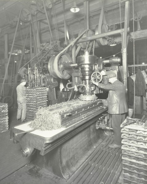Man using a miller and planer, Charlton Central Repair Depot, London, 1932. Artist: Unknown.