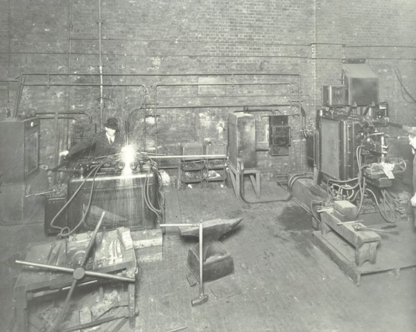 Men welding, Charlton Central Repair Depot, London, 1932. Artist: Unknown.