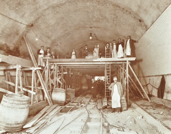 Workmen tiling the Rotherhithe Tunnel, London, December 1907. Artist: Unknown.