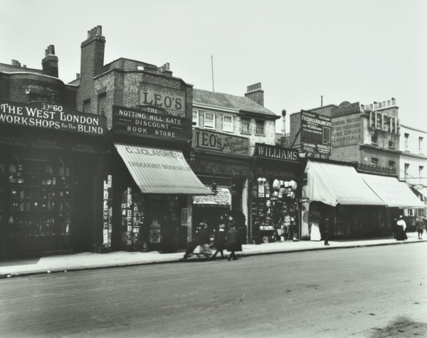 Row of shops including the West London Workshops for the Blind, London, 1913. Artist: Unknown.