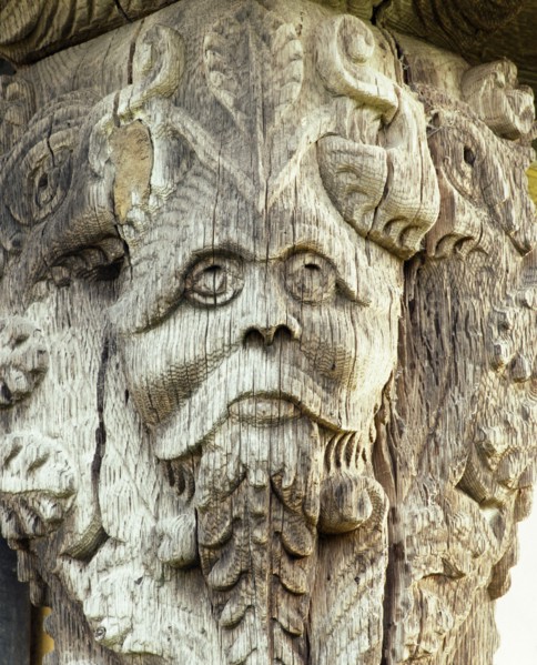 Carved head on the 17th century gatehouse corner post, Stokesay Castle, Shropshire