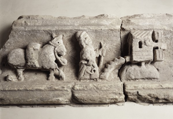 Stone carving depicting milling, museum of Rievaulx Abbey, North Yorkshire, c2013