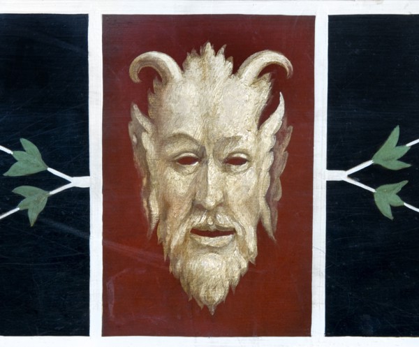 Detail of painted devil in the entrance lobby of Bankfield Museum, Halifax, West Yorkshire, c2010