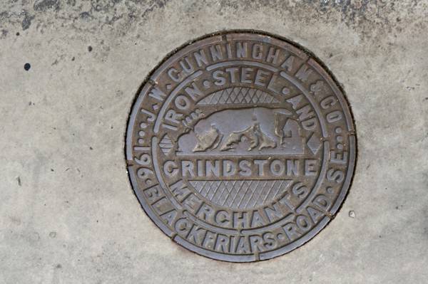 Coal hole plate made by JW Cunningham & Co, Lower Marsh, Lambeth, London, 2010