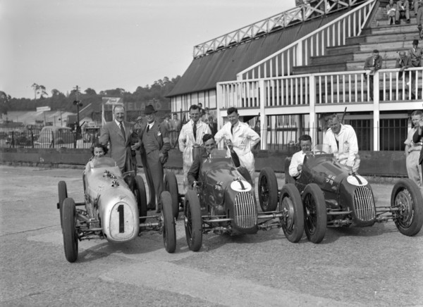 Austin 7 works team, Brooklands 1937. Artist: Bill Brunell.