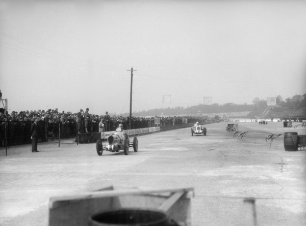 MG cars of Doreen Evans and John Henry Tomson Smith, JCC International Trophy, Brooklands, 1936. Artist: Bill Brunell.