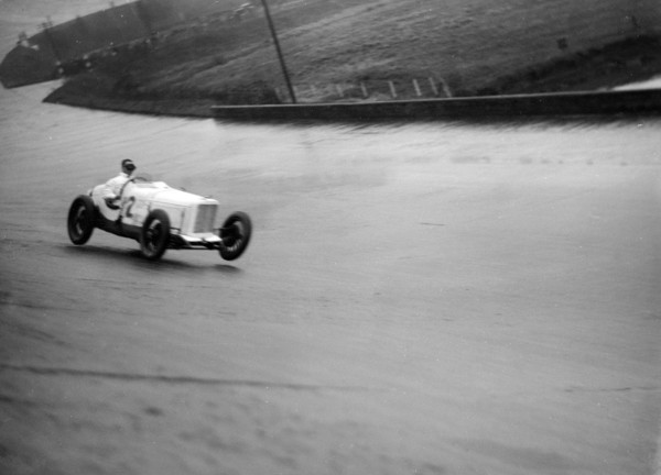 Sunbeam racing at a BARC meeting, Brooklands, 16 May 1932. Artist: Bill Brunell.
