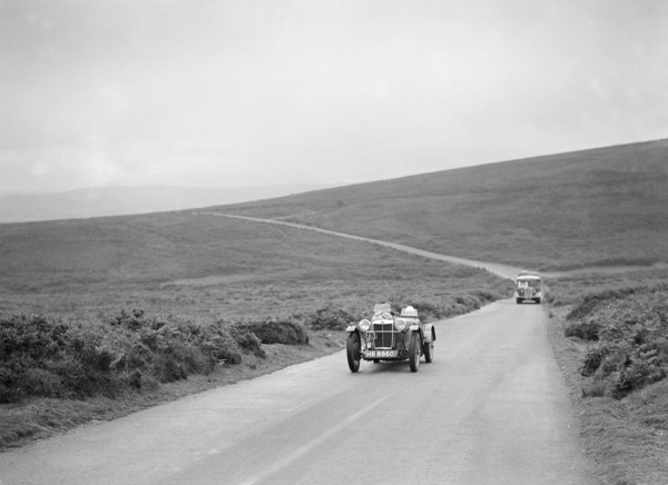 EC Haesendonck's MG PB competing at the MCC Torquay Rally, July 1937. Artist: Bill Brunell.