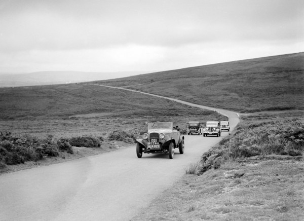 Ford V8s of WCN Norton and J Harrison competing at the MCC Torquay Rally, July 1937. Artist: Bill Brunell.