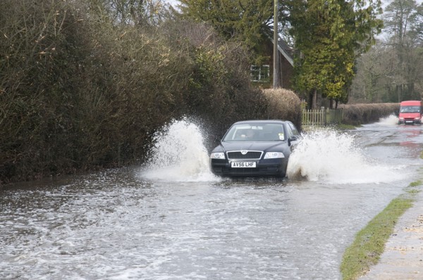 Skoda driving fast through floodwater at Beaulieu 2008. Artist: Unknown.