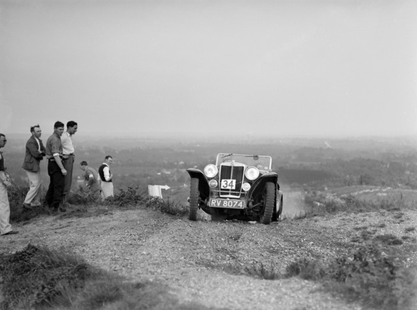 1936 MG PB 2-seater sports taking part in the NWLMC Lawrence Cup Trial, 1937. Artist: Bill Brunell.
