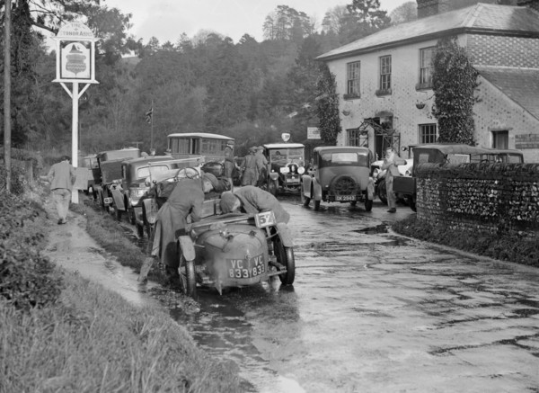 Riley Brooklands outside the Stonor Arms Hotel, Henley-on-Thames, Inter-Varsity Trial, 1930. Artist: Bill Brunell.