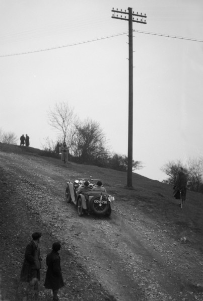 Miss EV Watson's MG J3 climbing Nailsworth Ladder, Sunbac Colmore Trial, Gloucestershire, 1934. Artist: Bill Brunell.