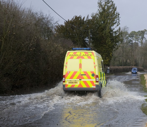 Ambulance driving through Floods at Beauleu 2008. Artist: Unknown.