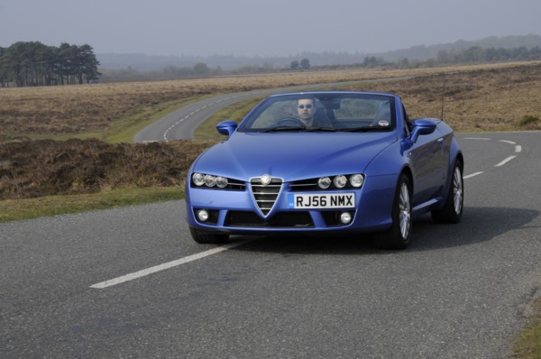 2006 Alfa Romeo Spyder driving in New Forest. Artist: Unknown.