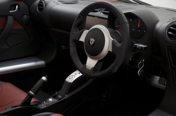 2010 Tesla Roadster Artist: Unknown.