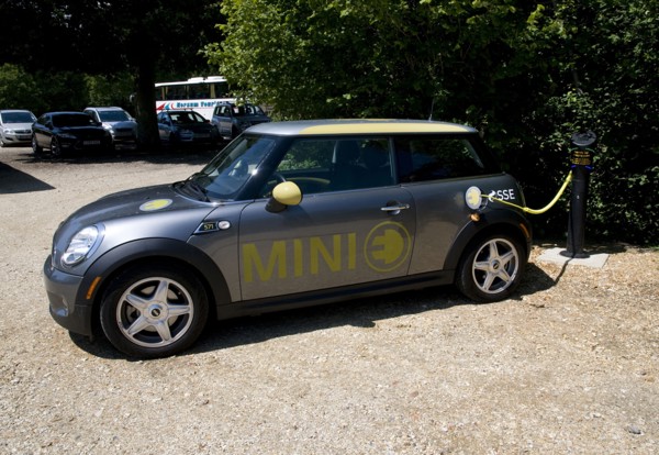 Electric Mini at battery charging point 2011 Artist: Unknown.