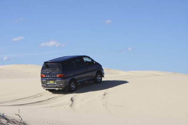 Mitsubishi Delica Space Gear V6 1996 in sand dunes New South Wales Australia Artist: Unknown.