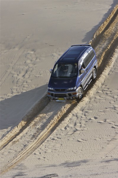 Mitsubishi Delica Space Gear V6 1996 in sand dunes New South Wales Australia Artist: Unknown.