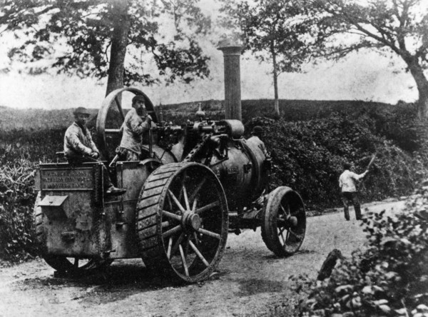 1869 Tasker traction engine with red flag man at the front