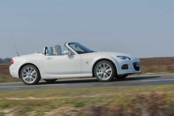 2014 Mazda MX5 Roadster Coupe Artist: Unknown.